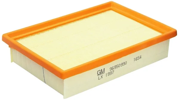 A yellow and orange filter is sitting on top of a table.