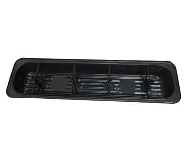 A black tray with four vents on top of it.