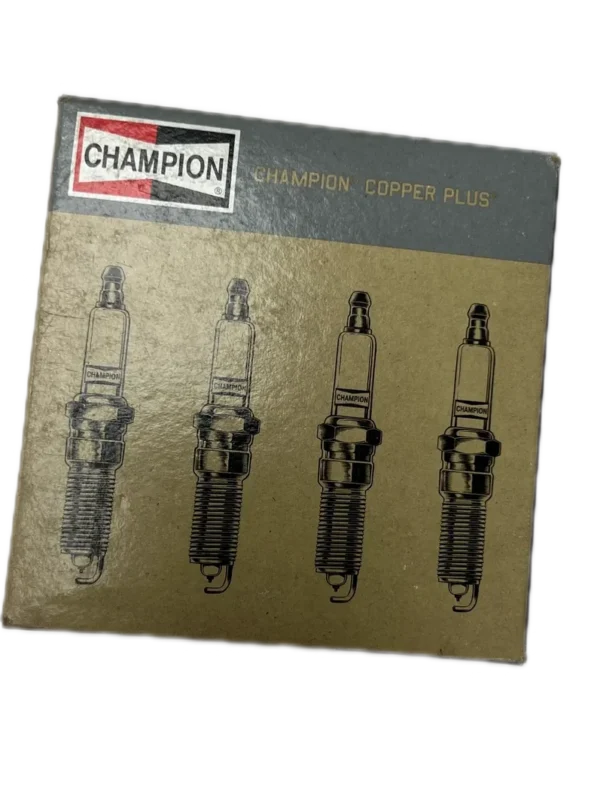 A box of spark plugs for a car.