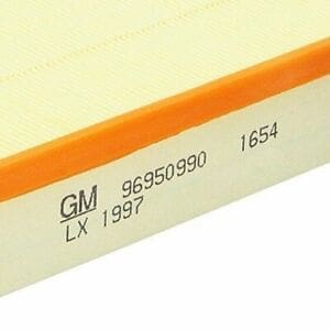 A close up of the gm logo on a paper