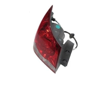 A red tail light with a black trim.