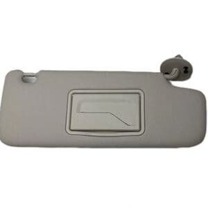 A gray sun visor with the handle on it.