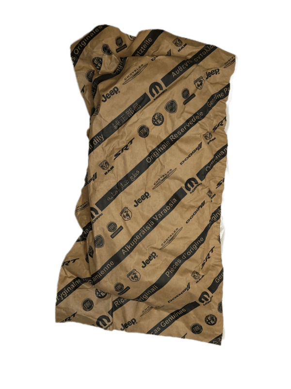 A brown and black wrapping paper with a picture of an arrow.