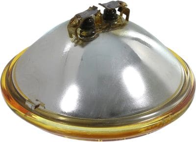 A silver dome with two crabs on top of it.