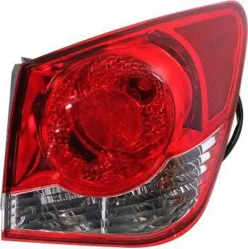A red and white tail light on a car.