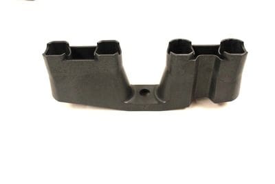 A black plastic holder for two magazines.
