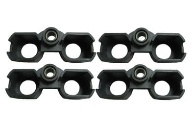 A set of four black plastic handles with two metal eyelets.
