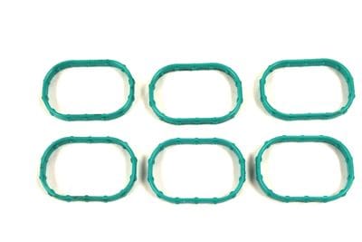A set of eight green rubber gaskets.